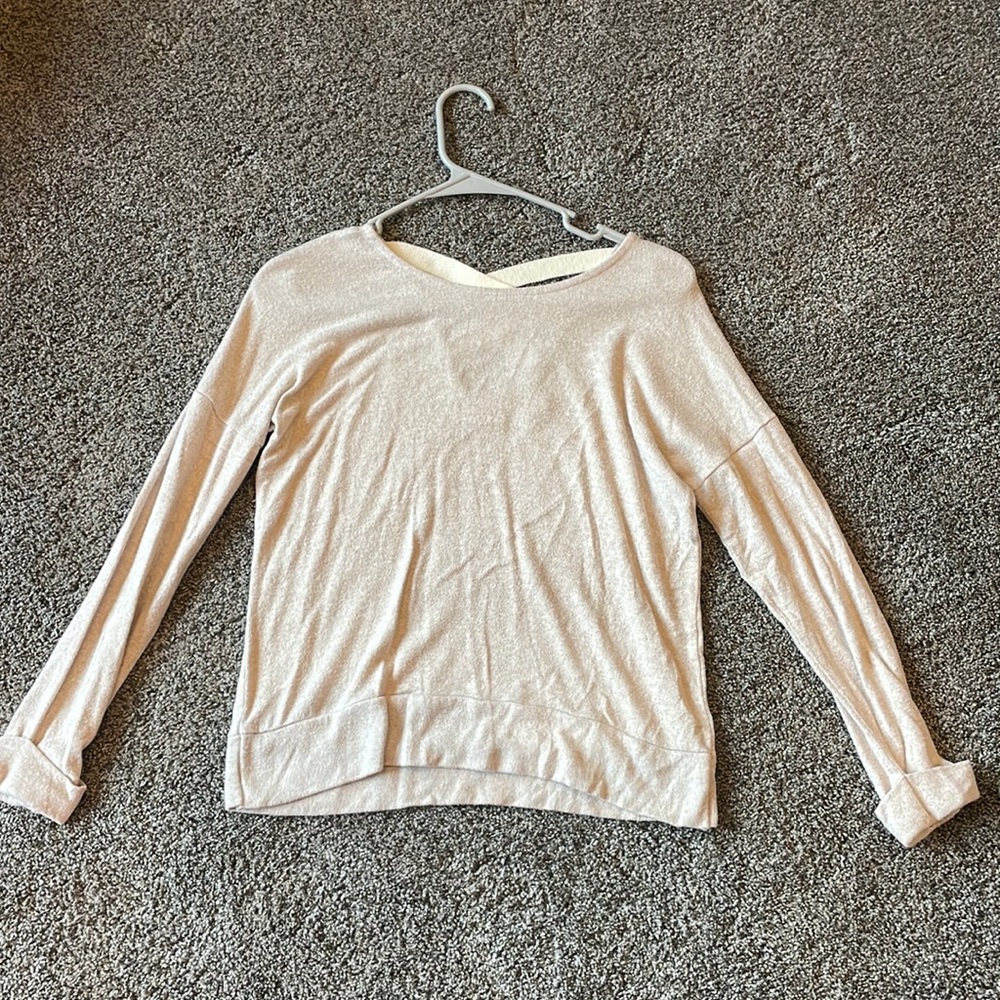 Long sleeve pink sweater. Women’s size xsmall. From the Buckle.
